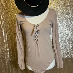 Pink body suit log sleeve